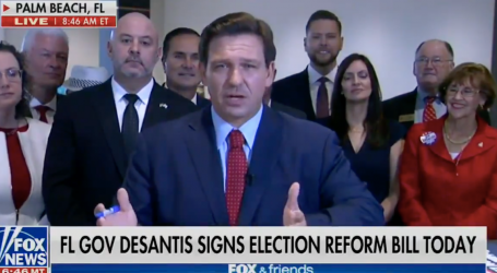 Florida Governor Ron DeSantis Signs a Voter Suppression Bill, and Fox News Has the Only Camera