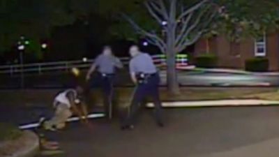 Video Shows White Officer Kicking Black Man in Face