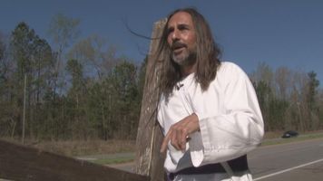 Ga. man takes his faith on the road, carries cross across state