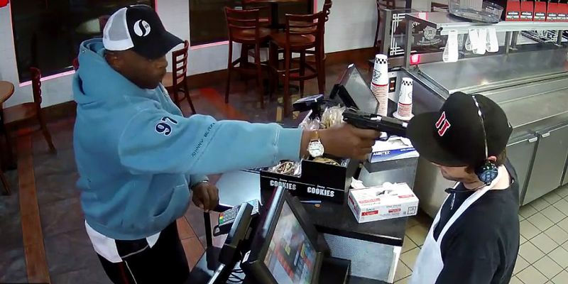 Crazy Video Shows Robber Put Gun To The Head Of An