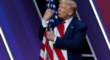 Trump Says Coronavirus Response Should Be Nonpartisan, Attacks Democrats, Kisses Flag