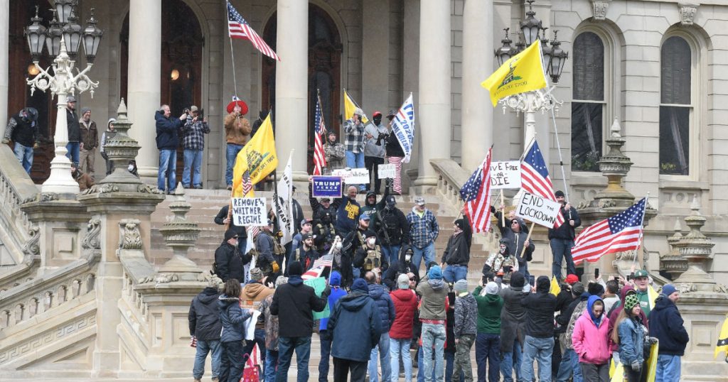 armed-protesters-stormed-the-michigan-statehouse-this-afternoon